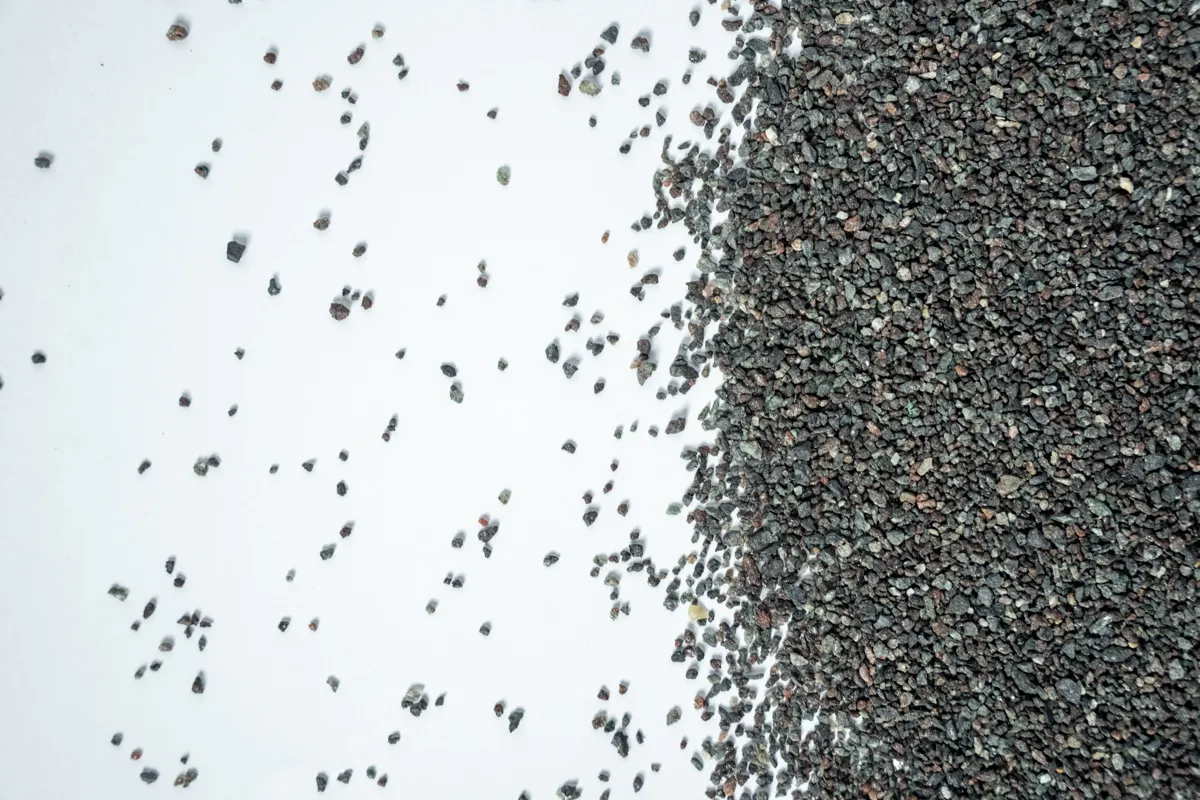 Dust Free Abrasive grit on a white surface